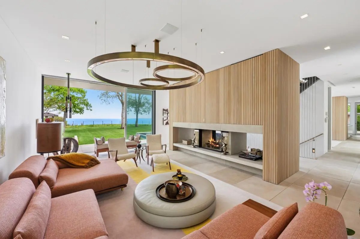 Living room with ring chandelier and water views